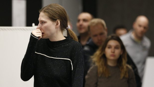 Relatives and friends of victims at Sheremetyevo Airport in Moscow, Russia.