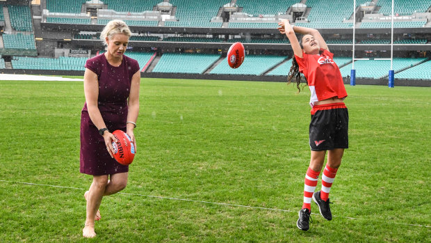 Game changer: Federal Sports Minister Bridget McKenzie and Zali Deep from the Swans academy.