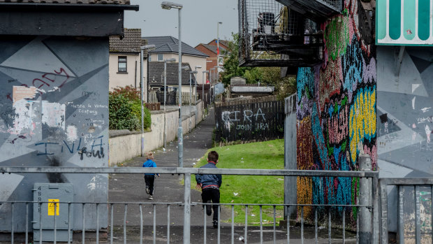 Graffiti from paramilitary groups in the Creggan area of Derry, Northern Ireland, in September.