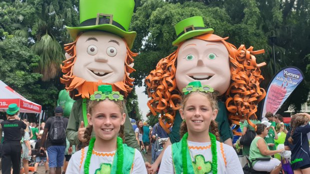 Brisbane twins Zamyra and Cherakeh Schmidt, 10, at the Brisbane Irish Festival after enjoying the parade.
