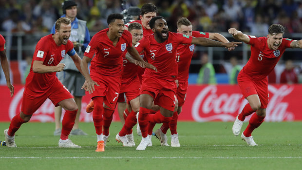 Anything is possible: England's players celebrate after their shootout win.