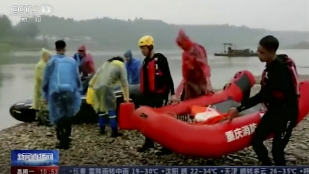 Rescue workers searching for drowned children in a river in Chongqing in June 2020. Drownings are the number one cause of accidental deaths for Chinese children, according to the World Heath Organisation. 