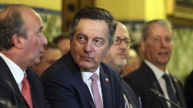 Chile's Foreign Minister Roberto Ampuero, centre, attends a meeting of the Lima Group concerning Venezuela in Lima, Peru, on Friday.