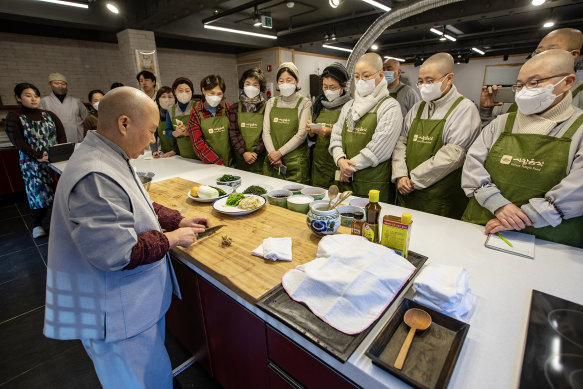 ‘Veganism is the medicine that will save your body’ … Jeong Kwan takes a cooking class.