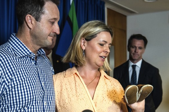 Danny and Elouise Massa hold a pair of shoes once worn by their son Joe, who died at Northern Beaches Hospital.