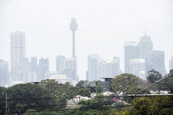 Sydney battled smog for another day as thunderstorms were predicted for Saturday.