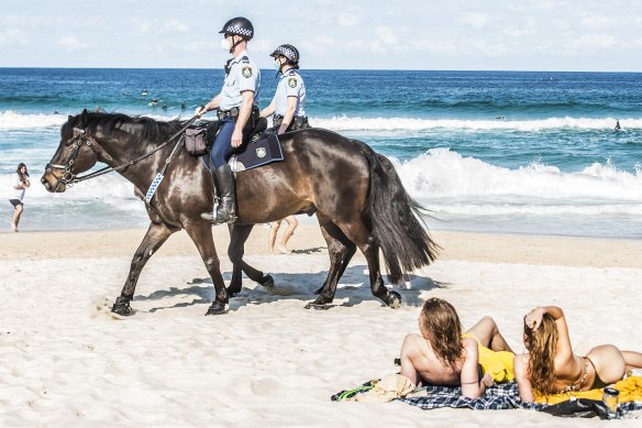 Police patrolling Bondi Beach to enforce COVID-19 restrictions in August last year.
