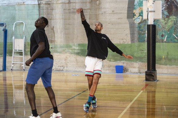 Kyrgios gets a shot off against Chol Adup.