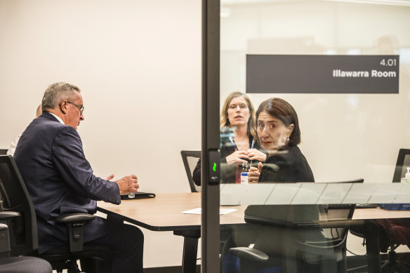 NSW Premier Gladys Berejiklian, NSW Health Minister Brad Hazzard and the state's Chief Health Officer Dr Kerry Chant at the State Emergency Operation Centre in Sydney Olympic Park in March.