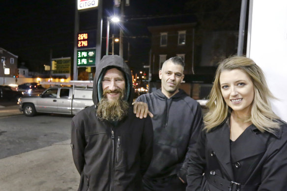 Johnny Bobbitt, left, Mark D'Amico and Kate McClure in Philadelphia last November. 