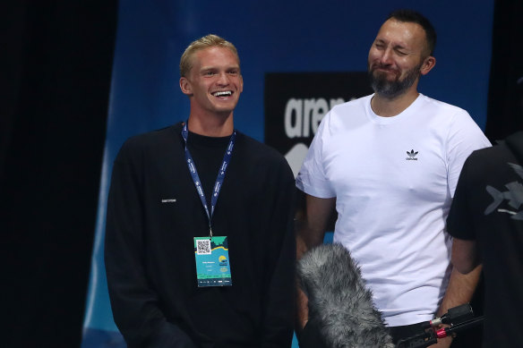 Cody Simpson and Ian Thorpe talk during the 2021 Australian Swimming Championships.