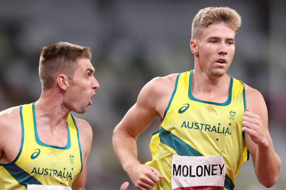 Ash Moloney is encouraged by teammate Cedric Dubler in the last event of the decathlon.