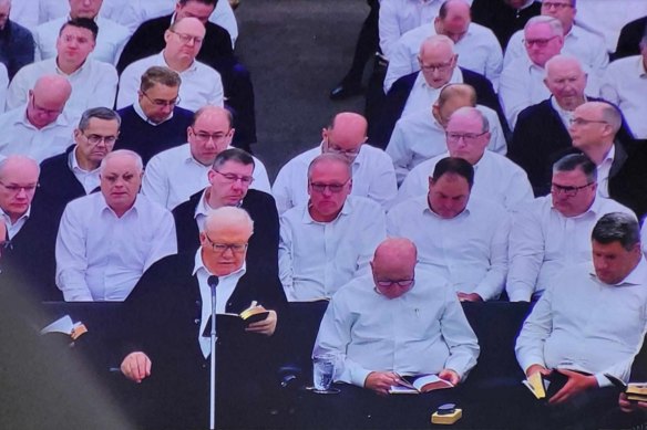 “Elect Vessel” of the Plymouth Brethren Christian Church Bruce D. Hales, left front, preaching earlier this month in Westfield, in the United States.