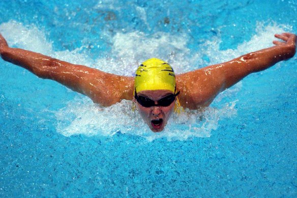 Madam Butterfly: Susie O’Neill with chest high and arms wide in the 200 fly.