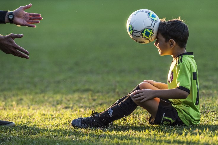 Soccer headers and children: Why kids shouldn't be allowed to hit the ball  with their heads.