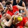 Toby Greene of the Giants tackles Sam Wicks of the Swans.