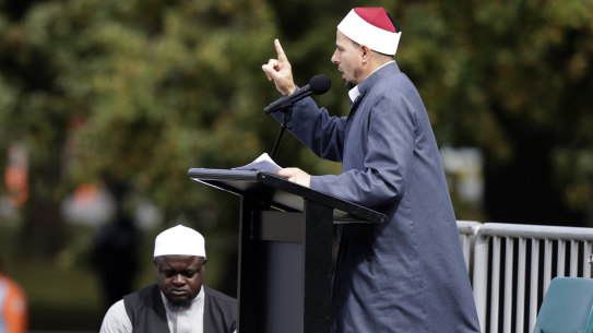 Imam Gamal Fouda addresses Friday prayers at Hagley Park in Christchurch a week after the massacre.