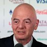 FIFA President Gianni Infantino speaks to the media alongside the World Cup trophy during a the opening press conference in Mexico.