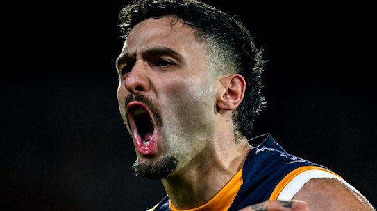 Izak Rankine of the Crows celebrates a goal.