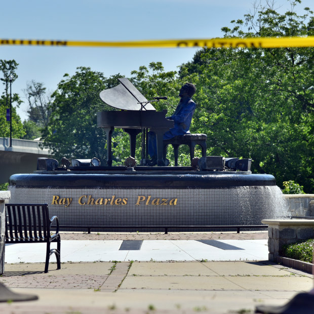 The musical statue to hometown hero Ray Charles in downtown Albany is switched off and silent.
