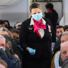 Qantas to lift mask requirement on some international flights