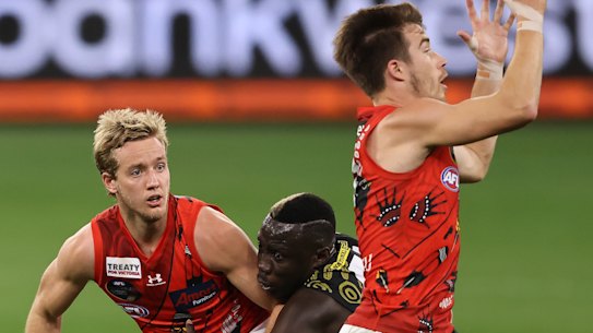 Darcy Parish (left) and Zach Merrett (right) have formed a formidable combination for the Bombers.