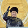 Kim Jong-un vows nuclear might in elaborate ballistic missile parade