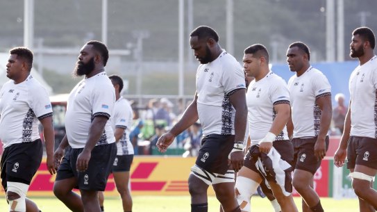 At a loss: Fiji shellshocked after losing to Uruguay in Kamaishi on Wednesday. 