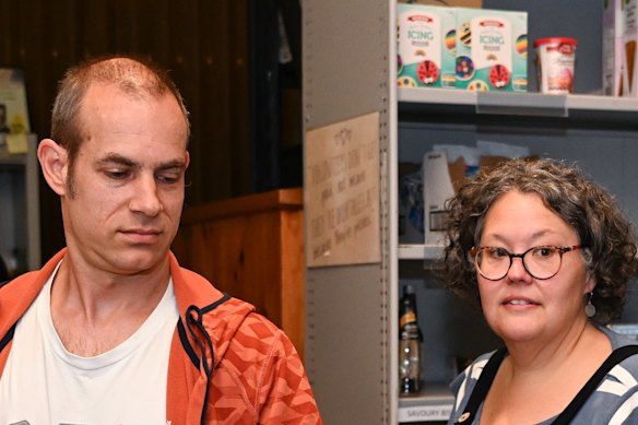 Andrea Norwood and Josh Palmer pick up food relief and supplies in Bayswater.