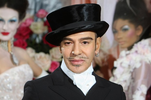 Fashion designer John Galliano poses at the end of the presentation of the Dior Haute Couture spring/summer 2010 fashion collection on Jan. 25, 2010, in Paris. (AP Photo/Jacques Brinon, File)