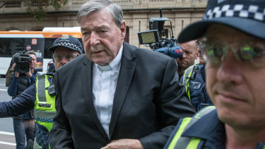 Cardinal George Pell arrives at the Melbourne County Court on Wednesday. 