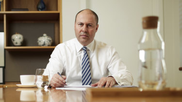 Treasurer Josh Frydenberg in his office working on his speech ahead of delivering his economic statement.