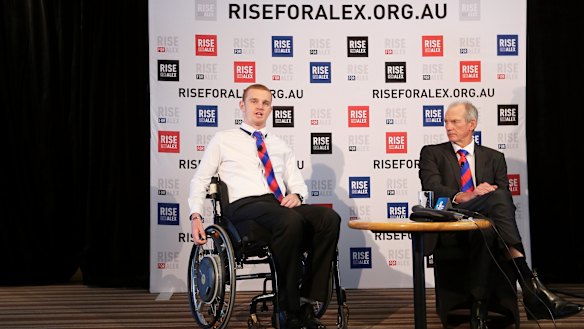Alex McKinnon and Wayne Bennett
at a press conference for the Rise for
Alex Round in 2014. 