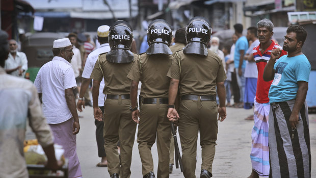 Sri Lankan policeman on patrol in a Muslim neighbourhood in Colombo.