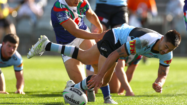 Shaun Johnson crosses for a Sharks try against his former club. 