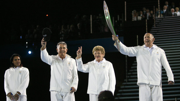 Baton carriers Cathy Freeman, Ron Clarke, Marjorie Jackson and John Landy at the 2006 Commonwealth Games.