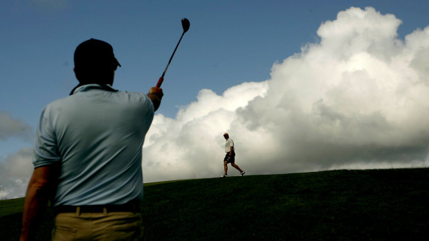 Golfers playing a round at St Michaels Golf Course at Little Bay in the eastern suburbs, which is Crown land.