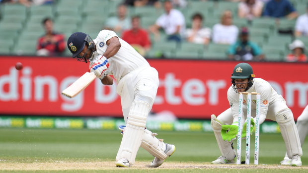 Mayank Agarwal hits a six during day four of the Boxing Day Test at the MCG on Saturday.
