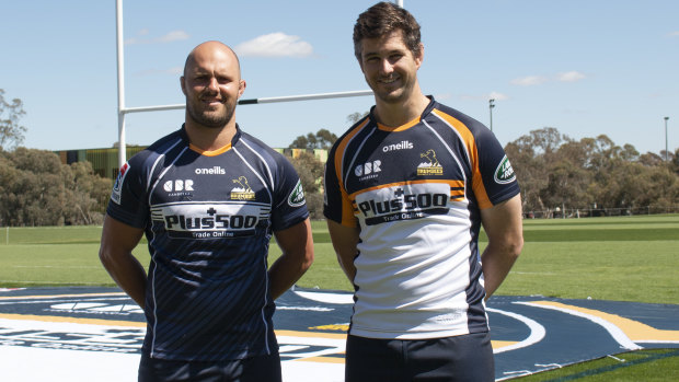 Lachlan McCaffrey and Sam Carter model the Brumbies' 2019 home and away strips. 