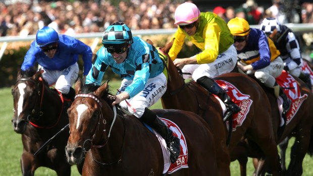 Emotional victory: Extra Brut ridden by John Allen wins the Victoria Derby at Flemington.