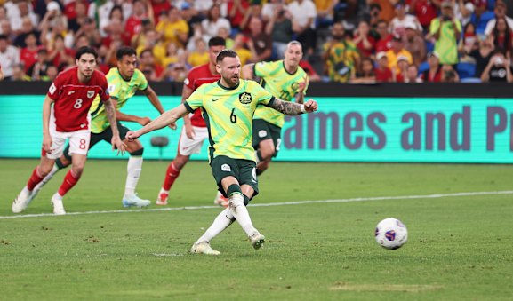 Martin Boyle scores from the penalty spot for the Socceroos against Indonesia at Allianz Stadium in March.