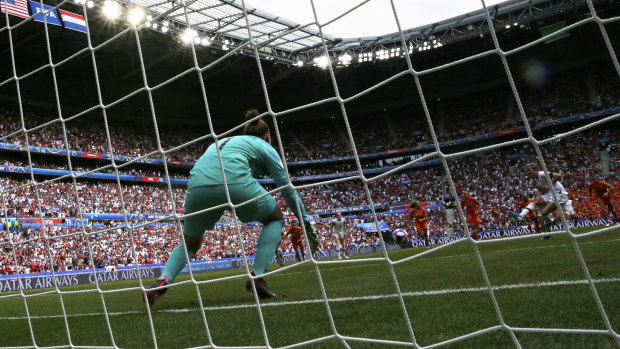 Megan Rapinoe scores the opening goal from the spot.