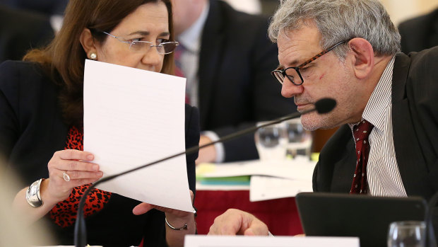 Premier Annastacia Palaszczuk with her chief of staff, David Barbagallo, during estimates hearings in July.