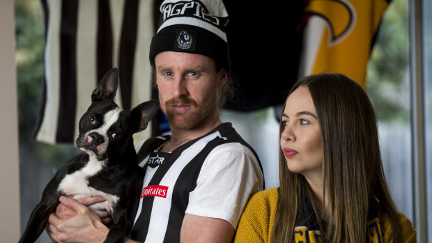Rachel says she sometimes feels outnumbered because their black and white Boston terrier Frankie is clearly a Collingwood supporter. 