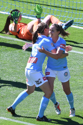 Rhali Dobson (right) scores for City.