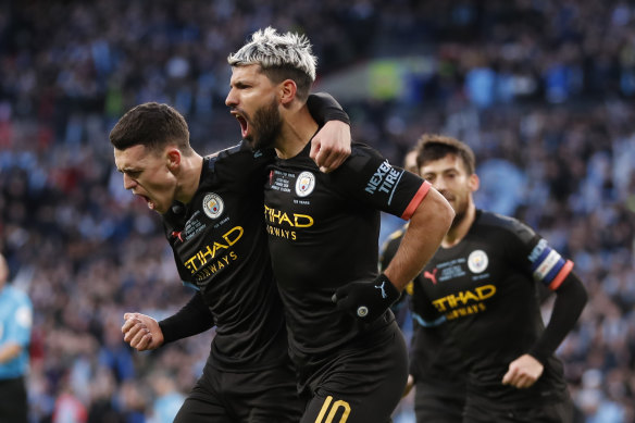 Sergio Aguero scored the winner for Manchester City in their third consecutive League Cup triumph.