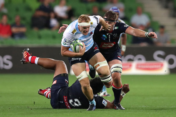 Waratahs lock Sam Caird makes a rare break for NSW on Friday night.
