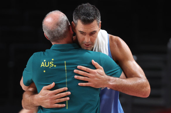 Luis Scola hugs the Boomers’ head coach Brian Goorjian after the match.