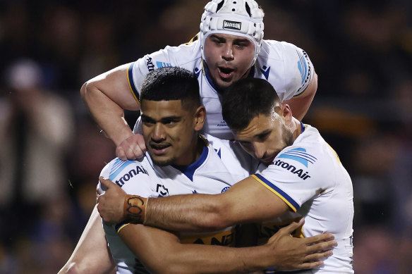 Oregon Kaufusi (centre) is shaping up  as a canny buy for the Sharks.