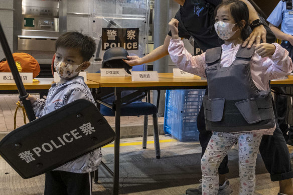 Young visitors at the Hong Kong Police College in Hong Kong during National Security Education Day on Thursday.